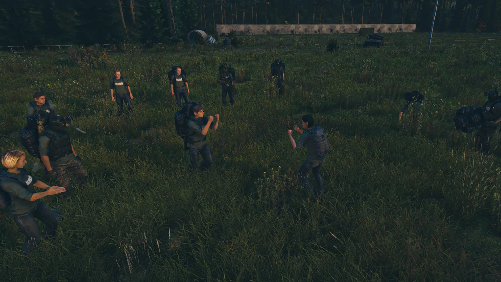 A group gathered in a field on Hacksaw