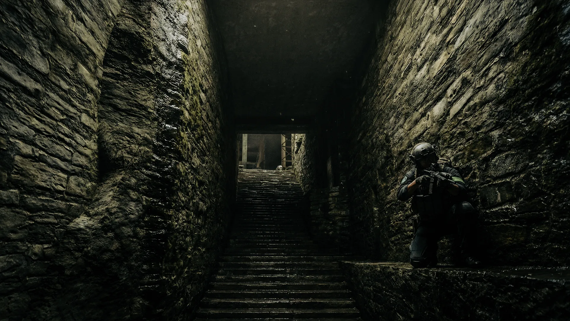 Armed survivor moving through a dark underground passage